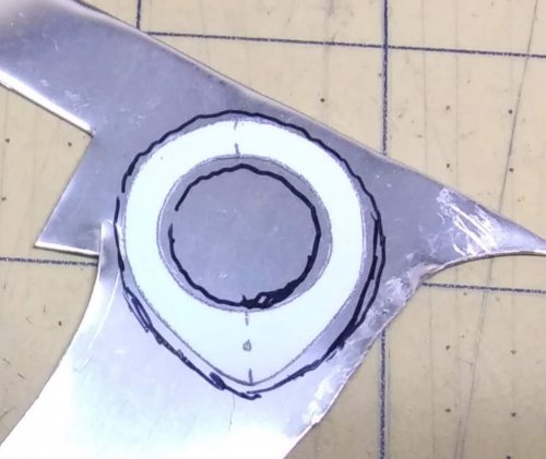 Judy Larson's Angel Ornament  - , Holiday Designs, Cutting, Cutting Tool, Cutters, Forging, Forging Jewelry, Jewelry Forging, How To Punch Holes, Hole Punching, Punch A Hole, Stamping, Stamps, Texturing, Draw radiating lines out from center around the halo shape.